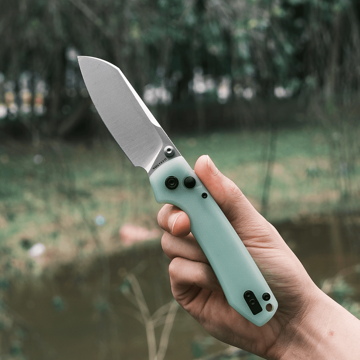 Raccoon® - Button Lock Knife (3.25" 14C28N Cleaver Blade & G10 Handle) - A0423